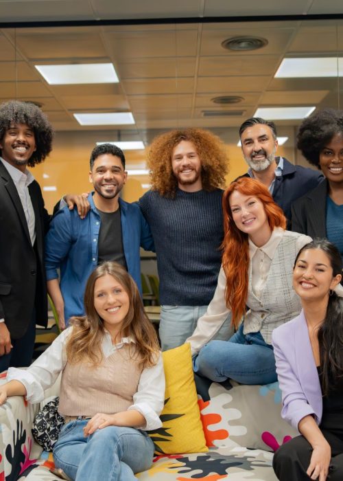 multicultural-team-posing-cheerfully-in-an-office-2024-02-26-20-52-02-utc.jpg